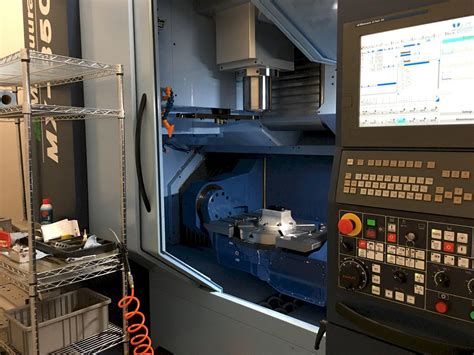 cnc machine center 5 axis|5 axis cnc machine specifications.